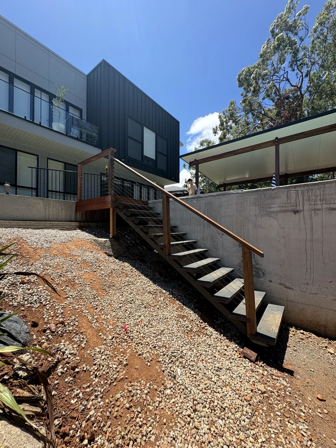 Modern timber exterior stairs and handrail